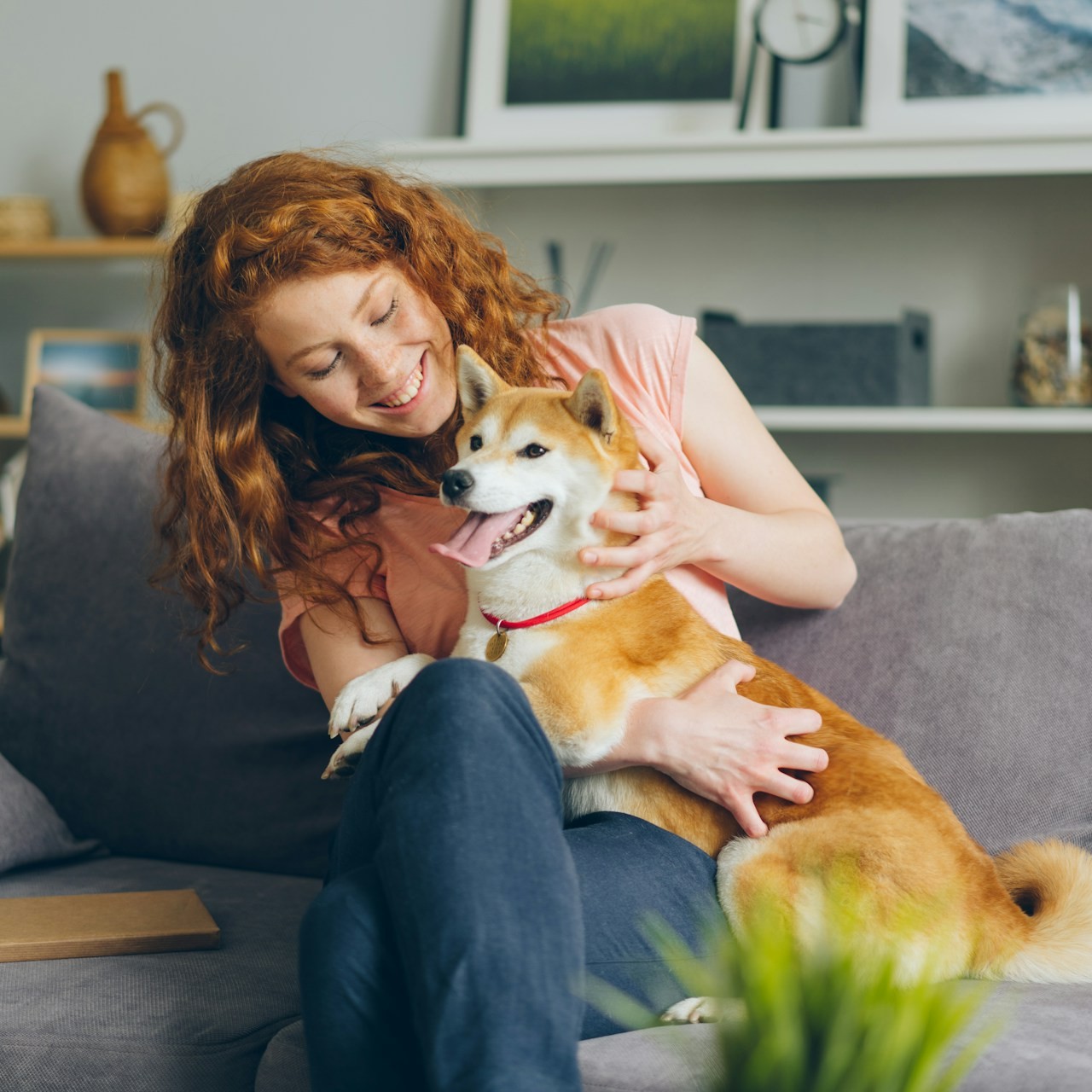 girl-is-playing-with-her-pet-dog